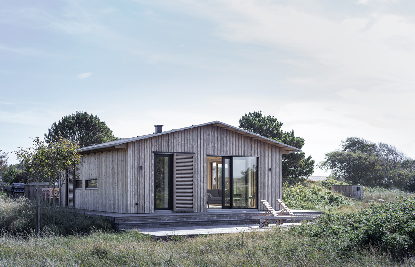 Lille sommerhus i Skagen på kanten af by og hede landskab — Fritidshuse i Skagen